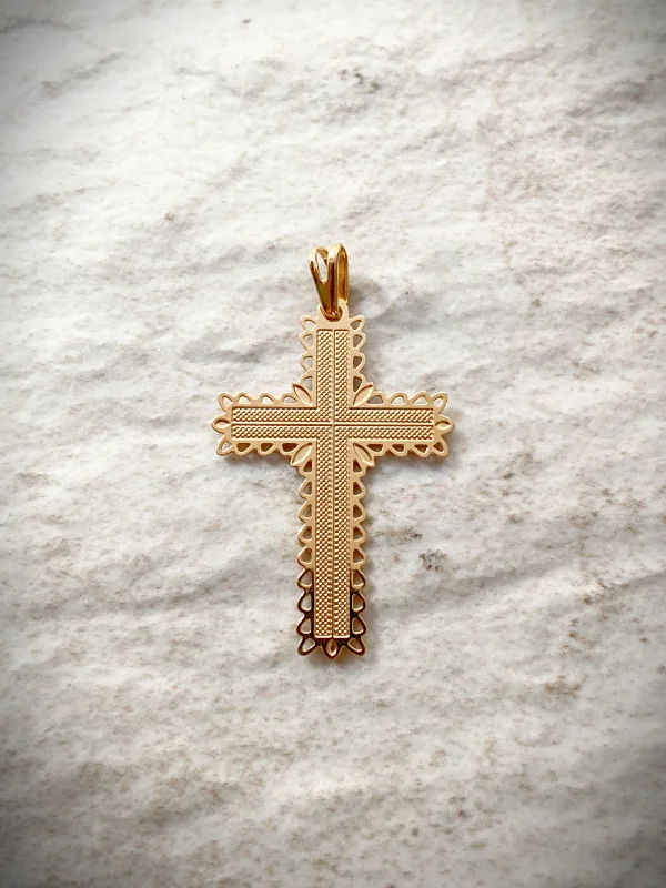 Intricate Cutout Gold Cross Pendant